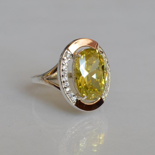 Срібна каблучка  зі вставками з золота