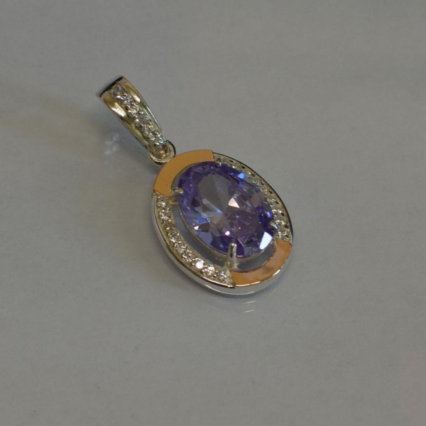 Серебряная подвеска со вставками из золота