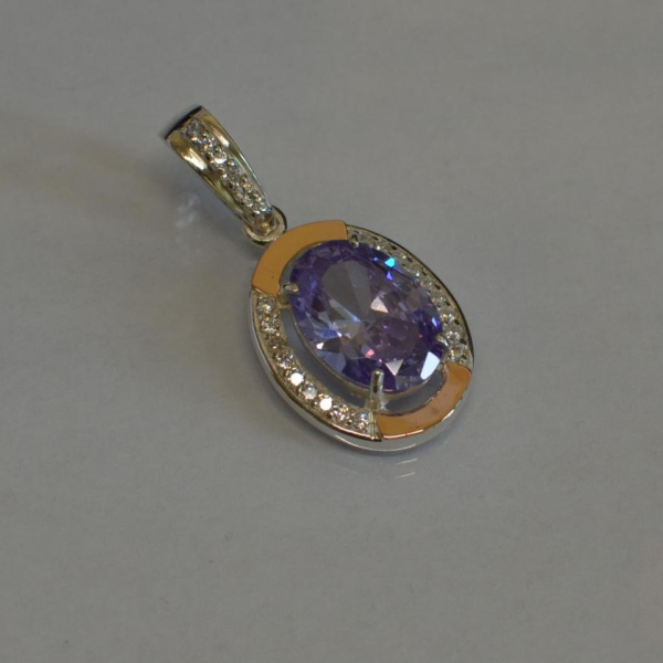 Серебряная подвеска со вставками из золота