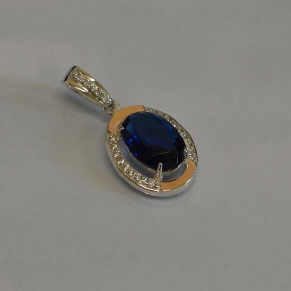 Серебряная подвеска со вставками из золота