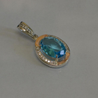 Серебряная подвеска со вставками из золота