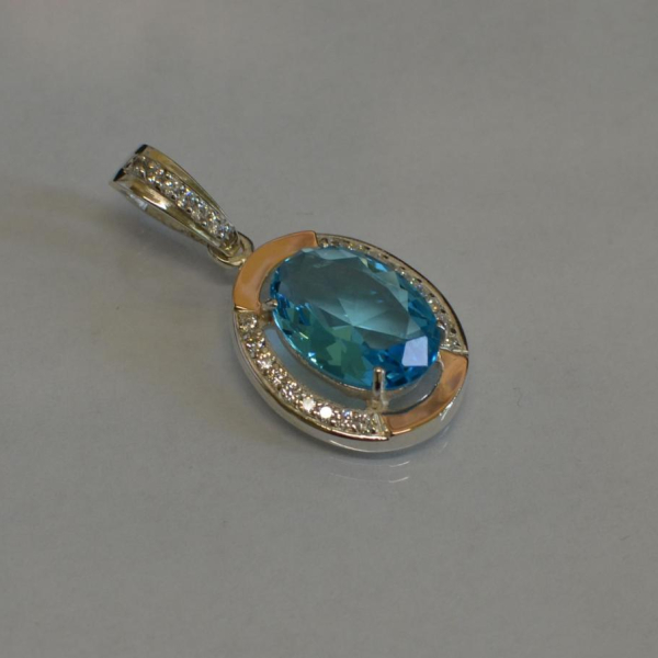 Серебряная подвеска со вставками из золота