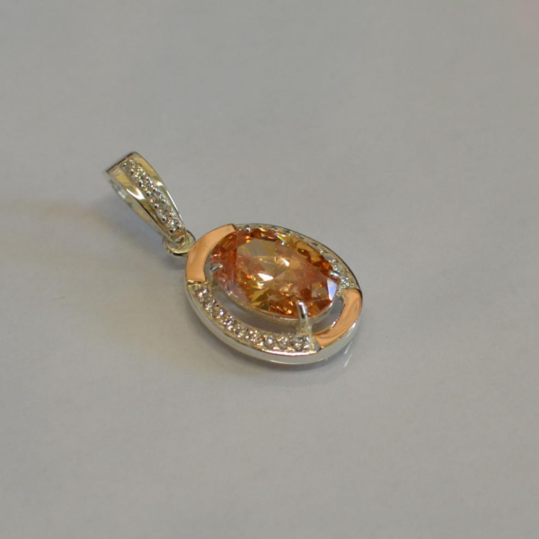 Серебряная подвеска со вставками из золота