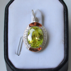 Серебряная подвеска со вставками из золота