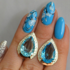 Срібні сережки з золотими пластинами