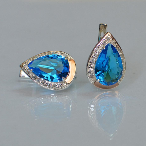 Срібні сережки з золотими пластинами