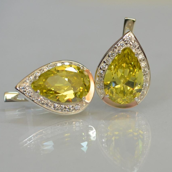 Срібні сережки з золотими пластинами