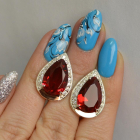 Срібні сережки з золотими пластинами