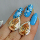 Срібні сережки з золотими пластинами