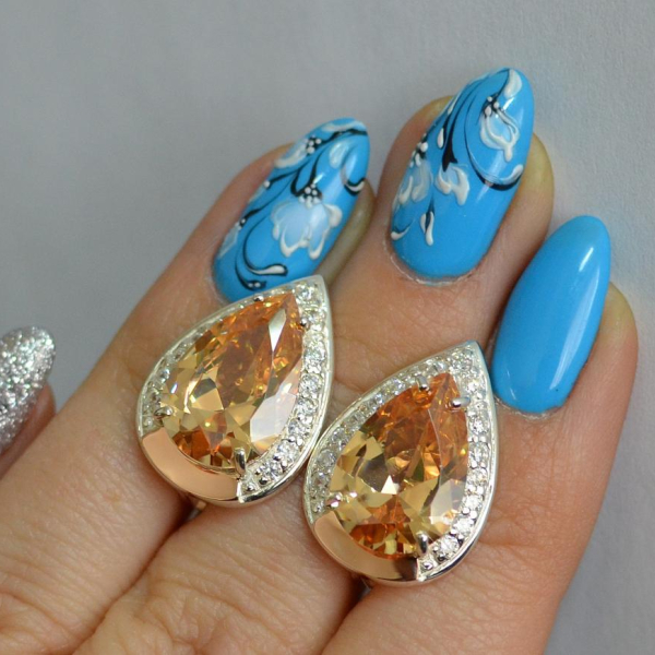 Срібні сережки з золотими пластинами