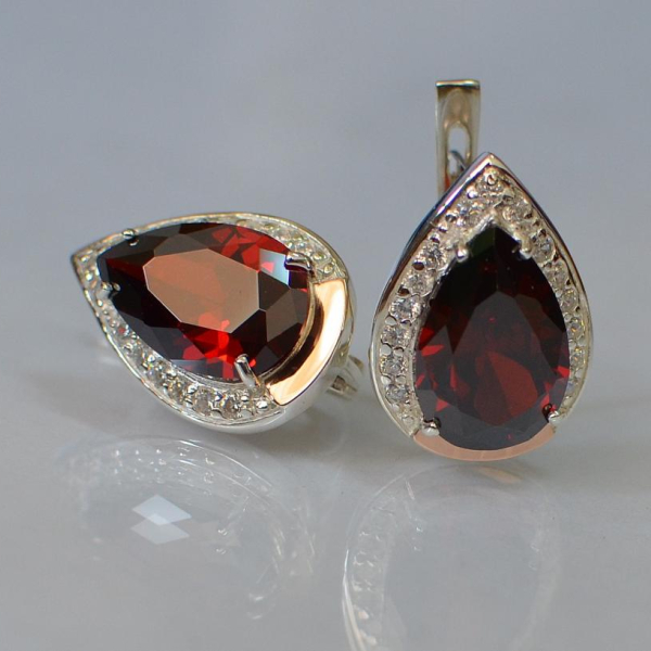 Срібні сережки з золотими пластинами