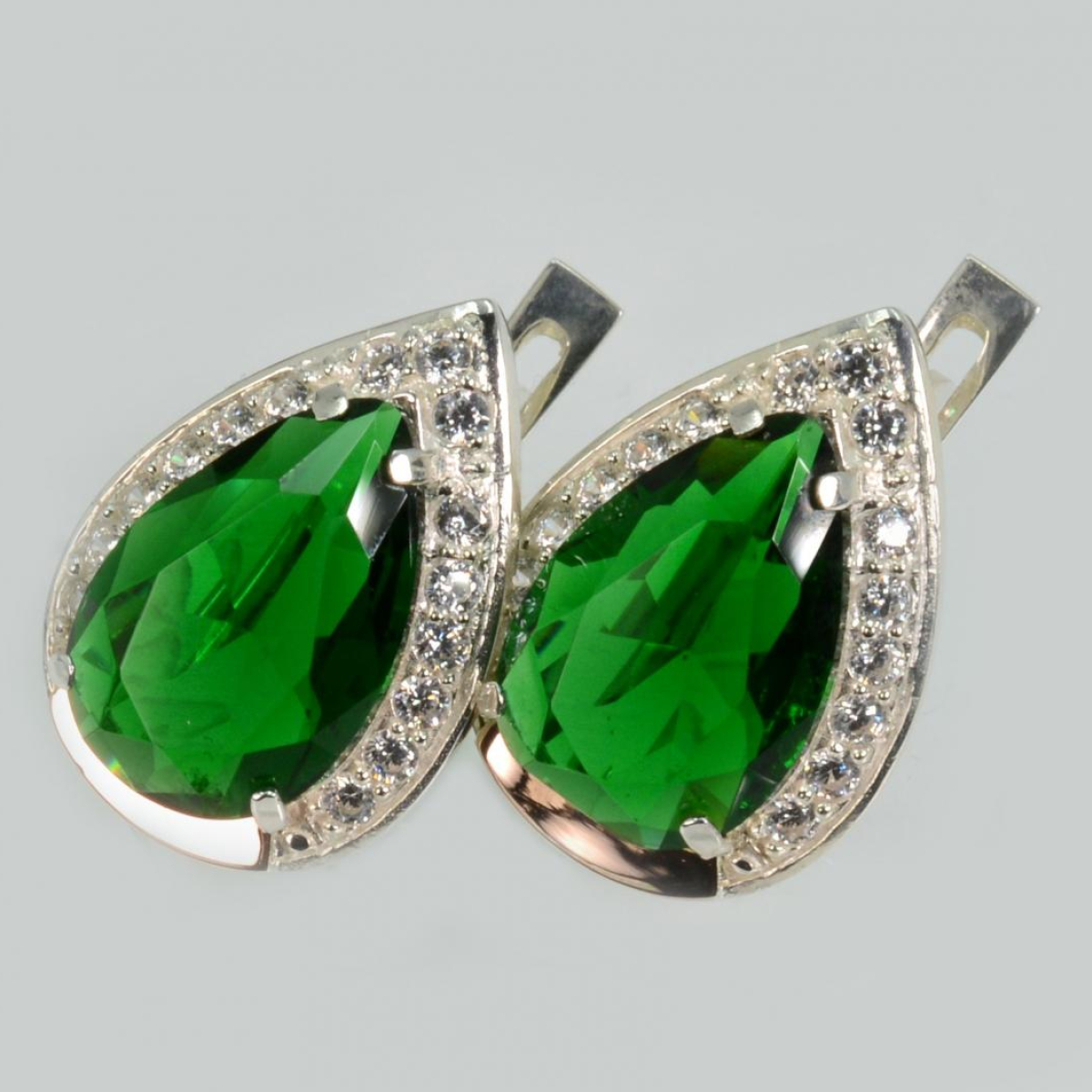 Срібні сережки з золотими пластинами