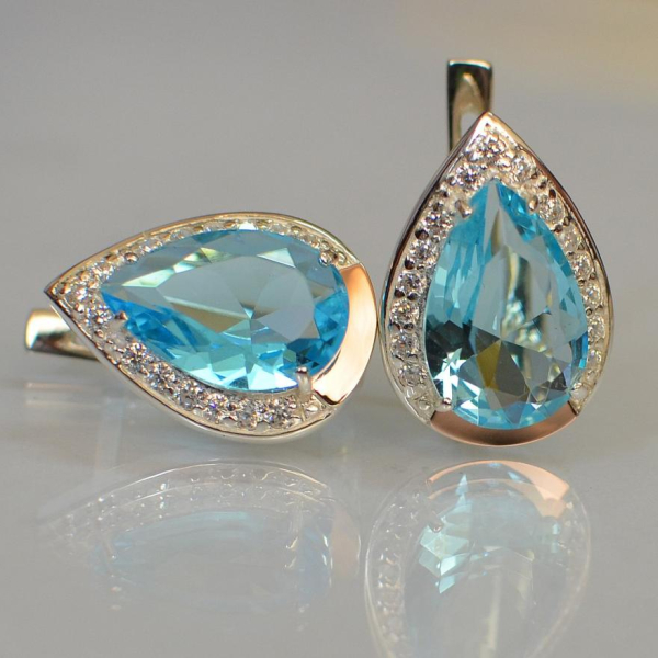 Срібні сережки з золотими пластинами