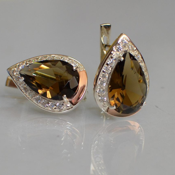 Срібні сережки з золотими пластинами