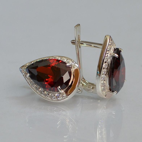 Срібні сережки з золотими пластинами