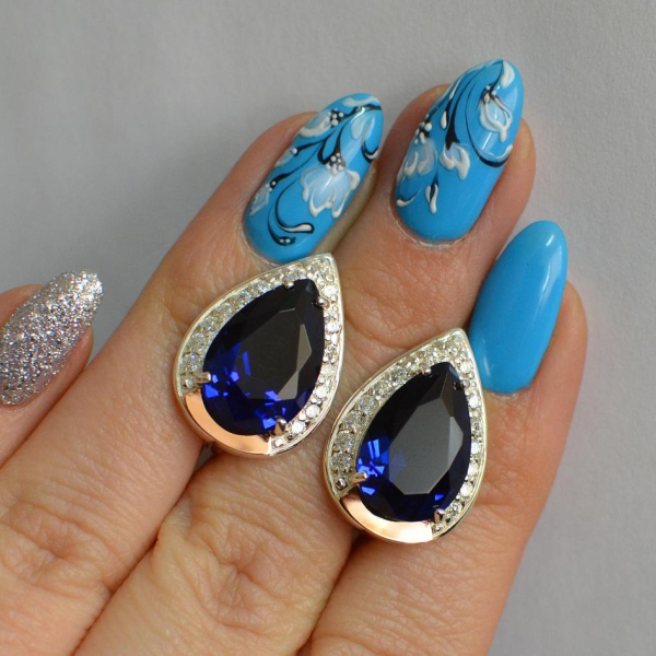 Срібні сережки з золотими пластинами