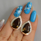 Срібні сережки з золотими пластинами