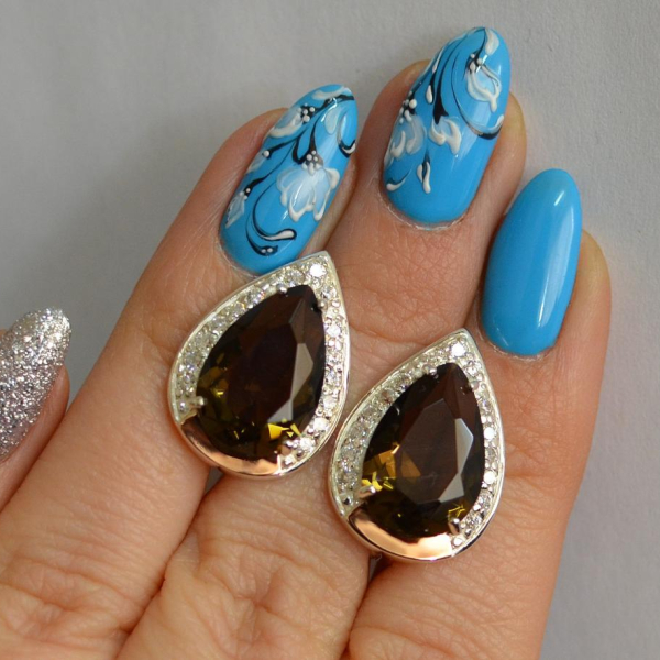 Срібні сережки з золотими пластинами