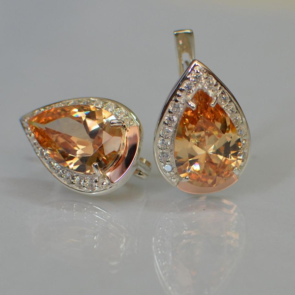 Срібні сережки з золотими пластинами