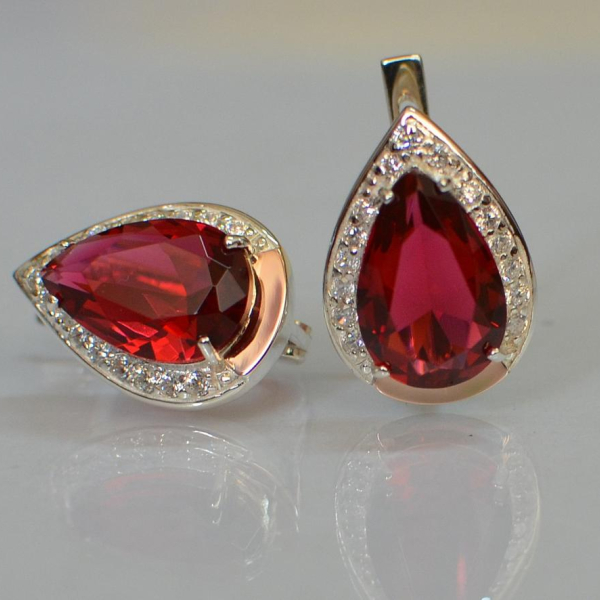 Срібні сережки з золотими пластинами