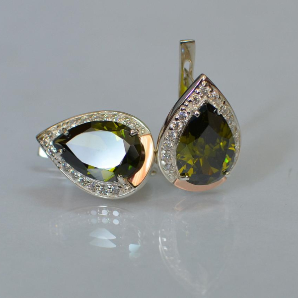 Срібні сережки з золотими пластинами