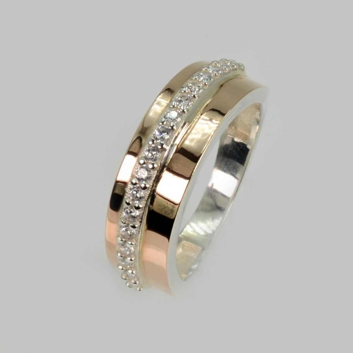 Срібна каблучка з золотими накладками