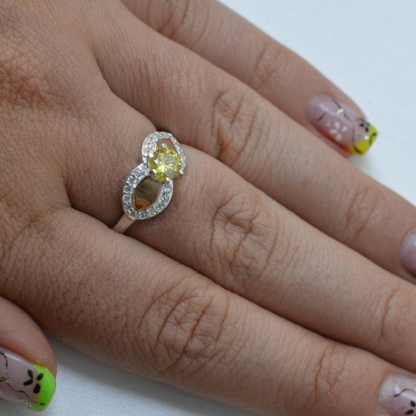 Срібна каблучка  зі вставками з золота