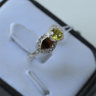 Срібна каблучка  зі вставками з золота