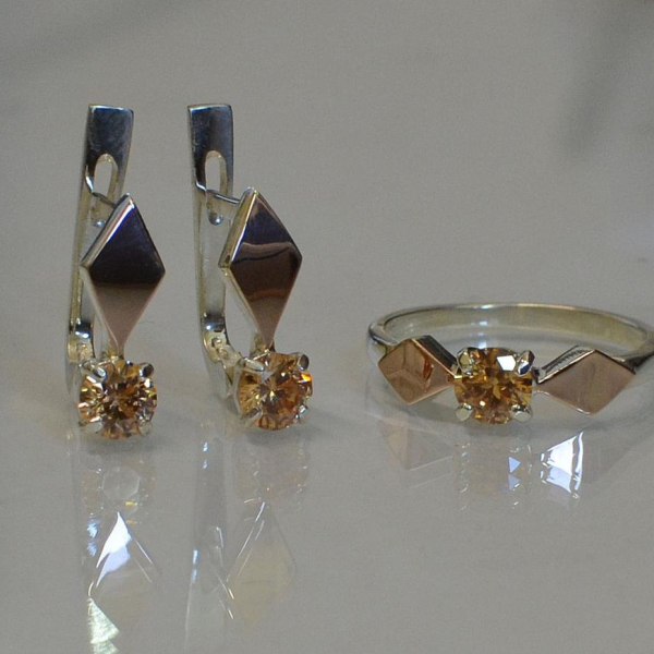 Срібний набір з пластинами із золота