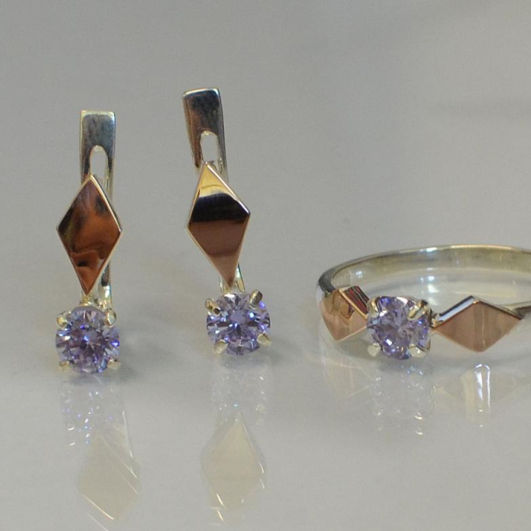 Срібний набір з пластинами із золота