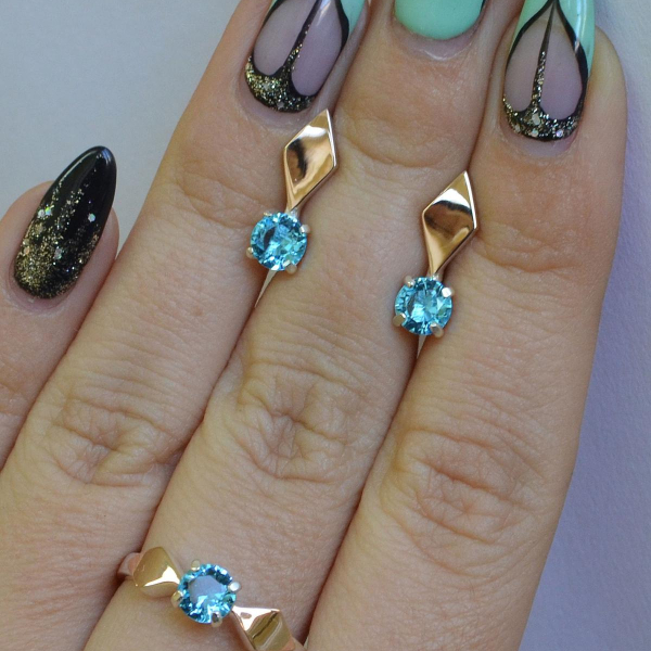 Срібний набір з пластинами із золота