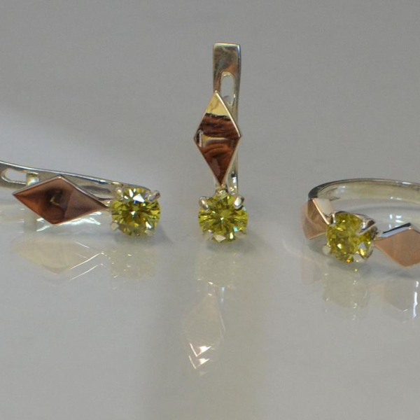 Срібний набір з пластинами із золота