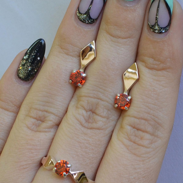 Срібний набір з пластинами із золота