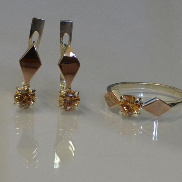 Срібний набір з пластинами із золота