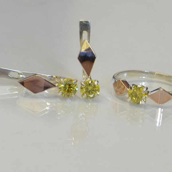 Срібний набір з пластинами із золота