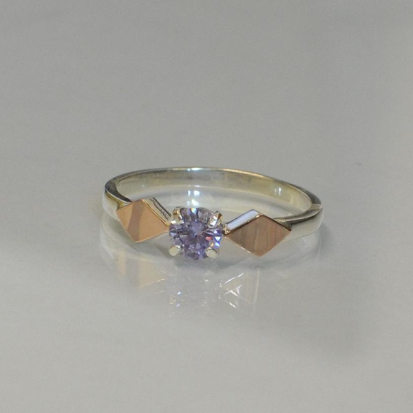 Срібна каблучка  зі вставками з золота