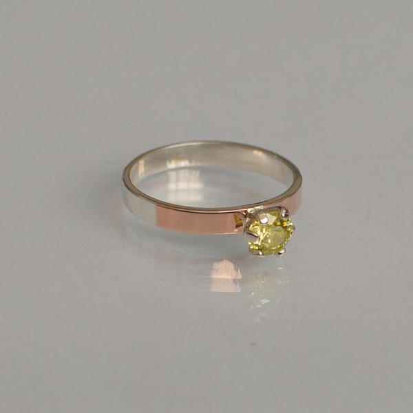 Срібна каблучка з золотими напайками