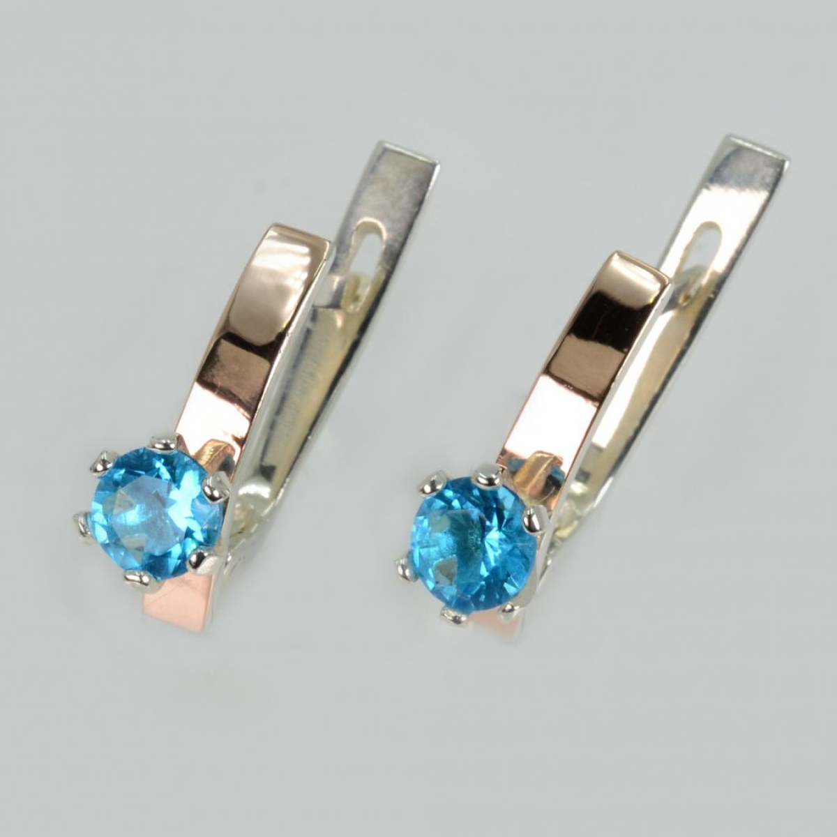 Срібні сережки з пластинами із золота