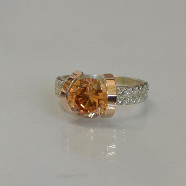 Срібна каблучка  зі вставками з золота