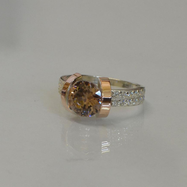 Срібна каблучка  зі вставками з золота