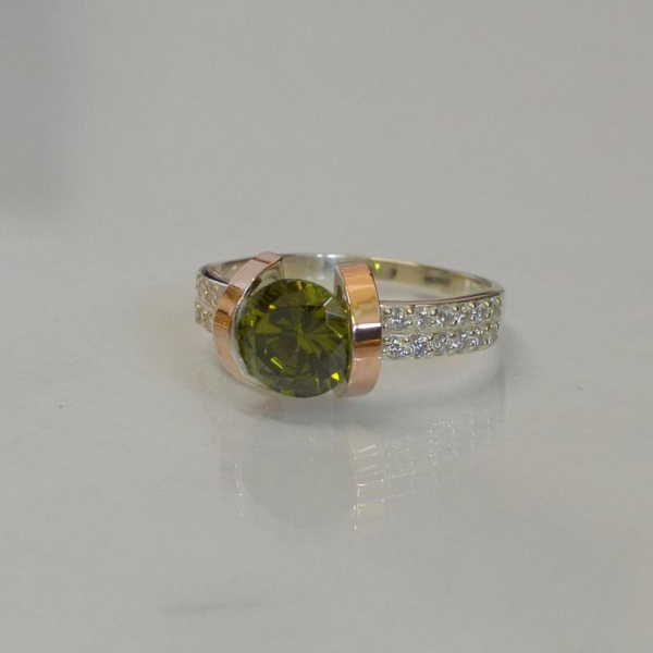 Срібна каблучка  зі вставками з золота