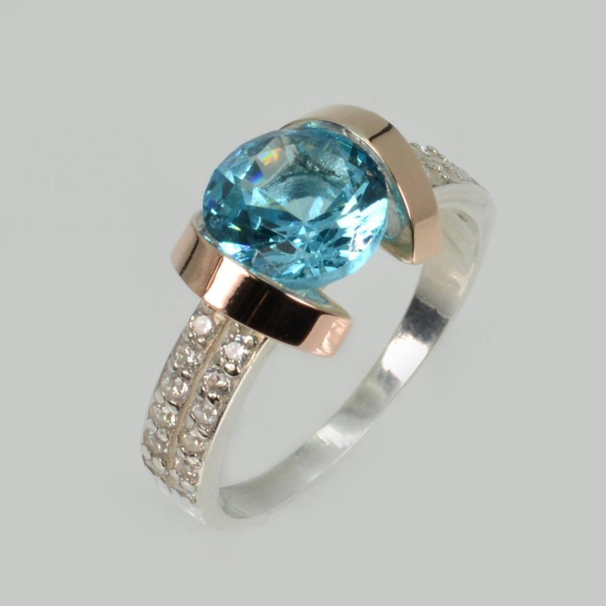 Срібна каблучка  зі вставками з золота