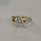 Срібна каблучка  зі вставками з золота