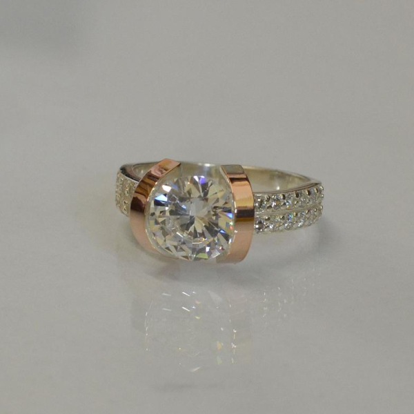 Срібна каблучка  зі вставками з золота