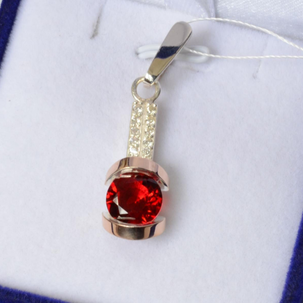 Срібна підвіска з пластинами золота