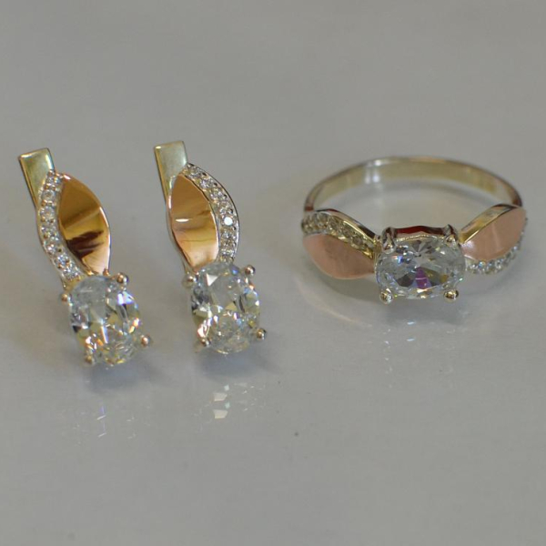 Срібний набір з золотими напайками