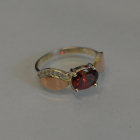 Срібна каблучка з пластинами із золота