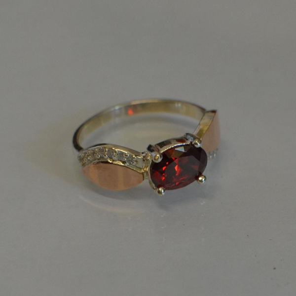 Срібна каблучка з пластинами із золота