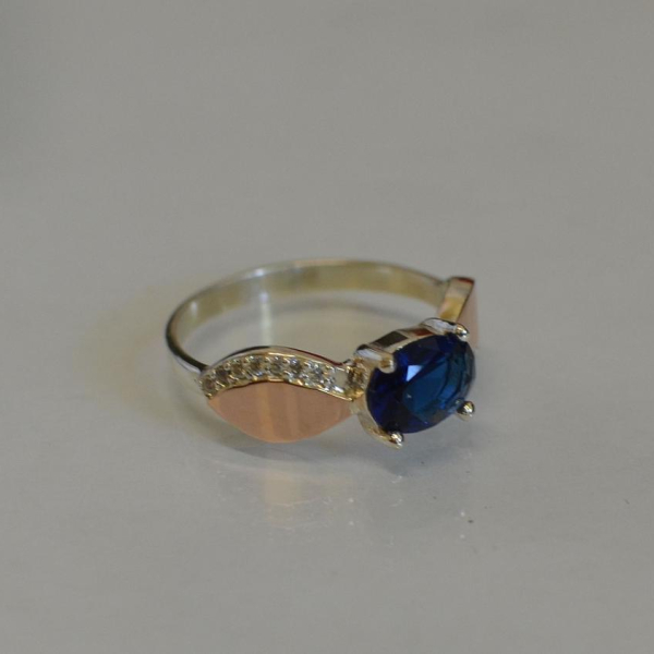 Срібна каблучка з пластинами із золота