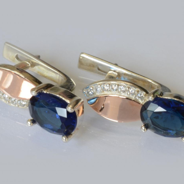 Срібні сережки з золотими вставками